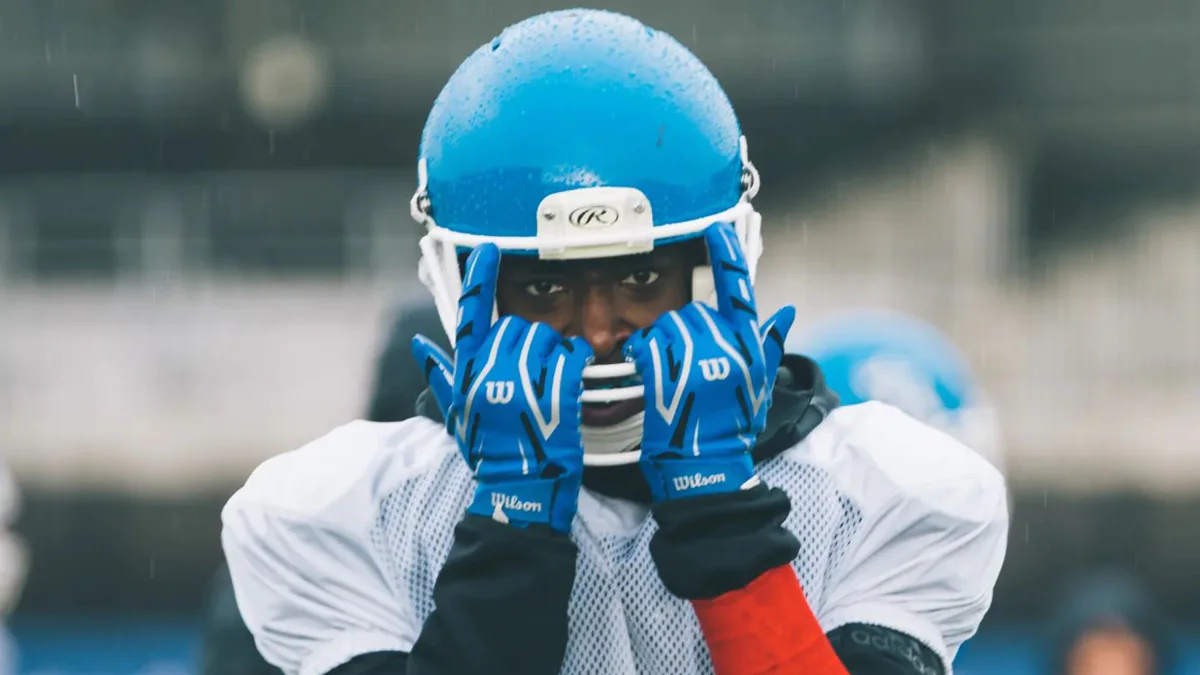 Youth player with helmet on