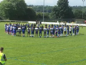 Titans and Leeds Academy stand together